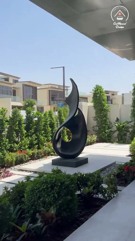 Still from one of our Dubai garden project videos, showing a sculptural feature and planting in the entrance garden