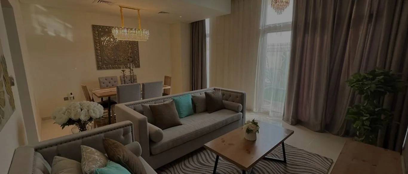 Living and dining room designed by OutMazed Design for Project Bold, Damac Hills 2, Dubai