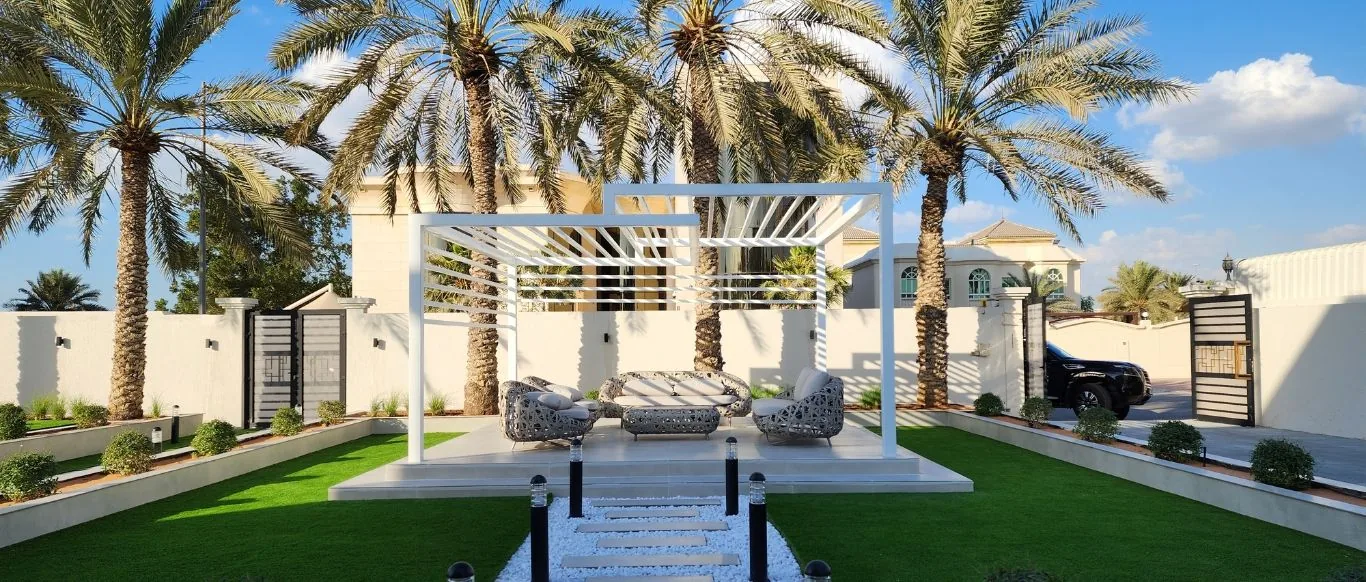 Gazebo with outdoor seating and landscaped garden built by OutMazed Design for Project Majestic, Al Twar, Dubai