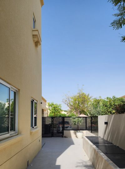 Side passage along the villa, Project Barn, The Springs