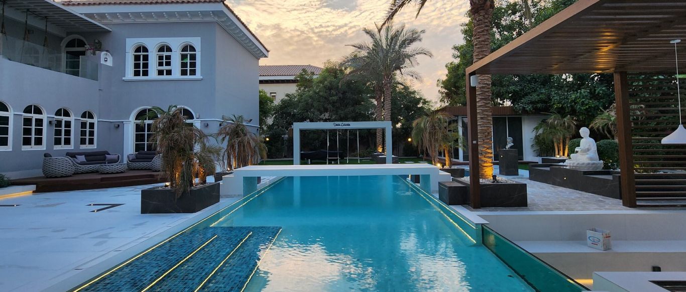 Poolside at Project Casa Colonia, The Villa, with underwater and perimeter LED lighting and a pergola